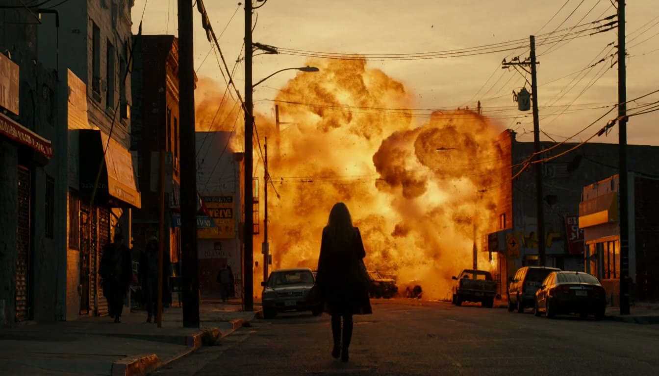 MiniMax H3 AI video example showing a woman walks down a city street as a large explosion erupts behind her
